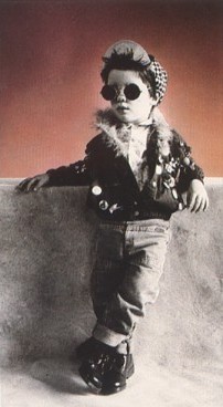 Featured is a postcard image of one very cool kid outfitted from head to foot in equally cool clothes.  All kids should be so cool!  Photographer/designer:  Iain McKell.  The original unused Athena Art Card is for sale in The unltd.com Store.